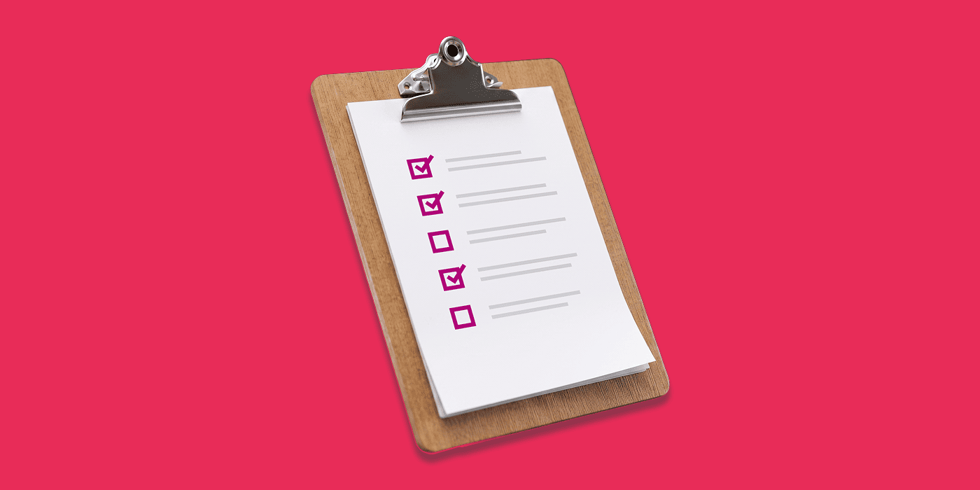Image of clipboard on coral background